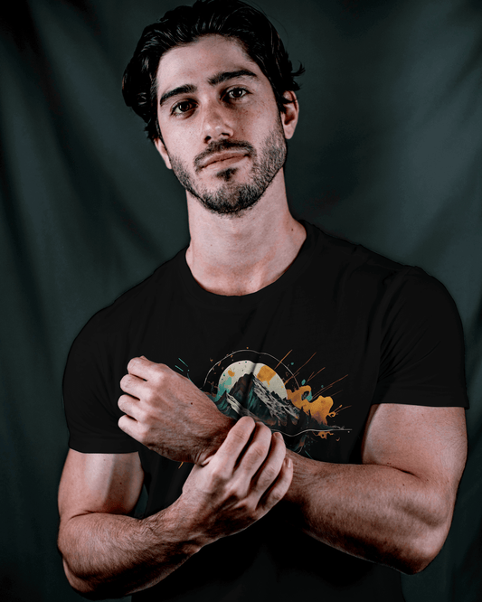 Stylish man wearing the Wyld Peak Peak Design organic cotton tee, perfect for everyday adventure wear