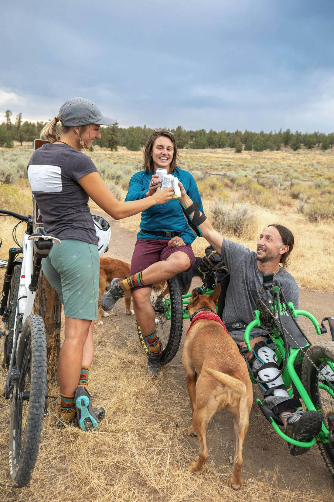 Group of disabled hikers enjoying conversation and connection on the trail – inclusive outdoor community in action