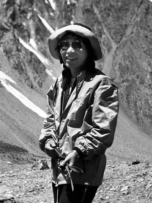 Junko Tabei standing in the Himalayas, black and white historic mountaineering photo