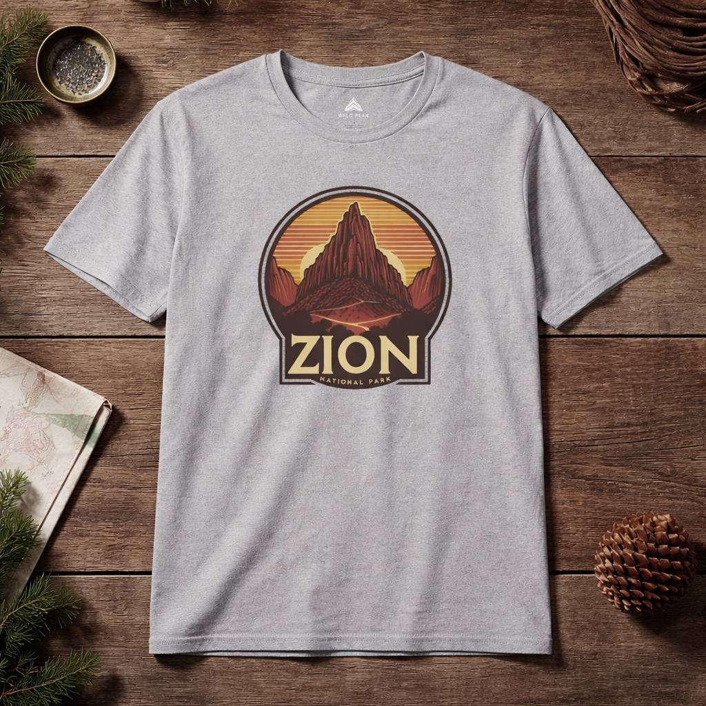 Gray t-shirt with Zion National Park graphic on a wooden surface