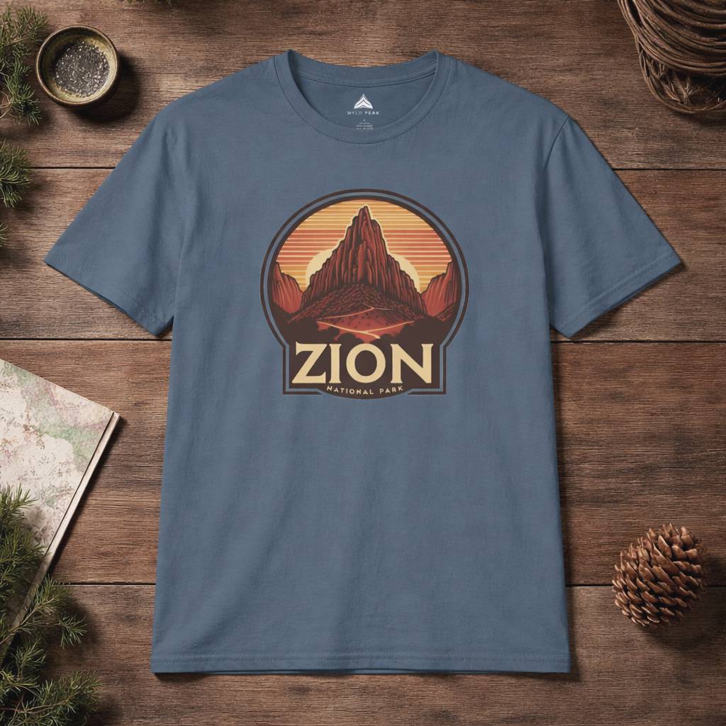 Blue t-shirt with Zion National Park graphic on a wooden surface