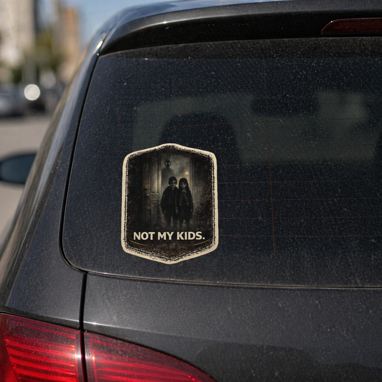 Car with a black eyed kids 'Not My Kids' sticker on the back