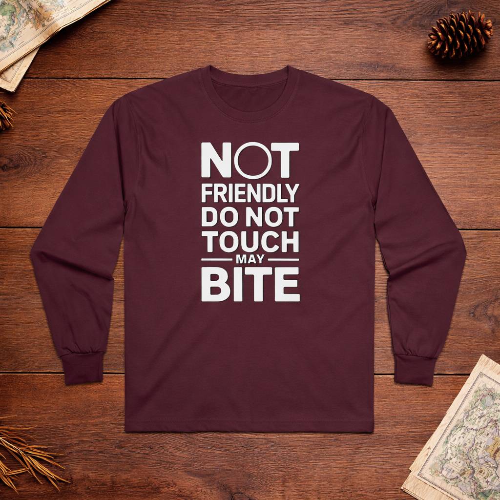 Maroon long-sleeve shirt with white text on a wooden surface