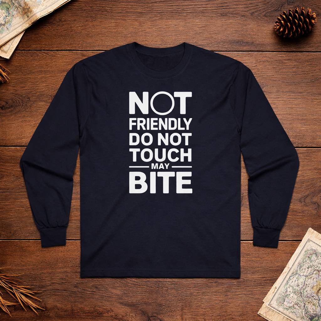 Black long-sleeve shirt with white text on a wooden surface