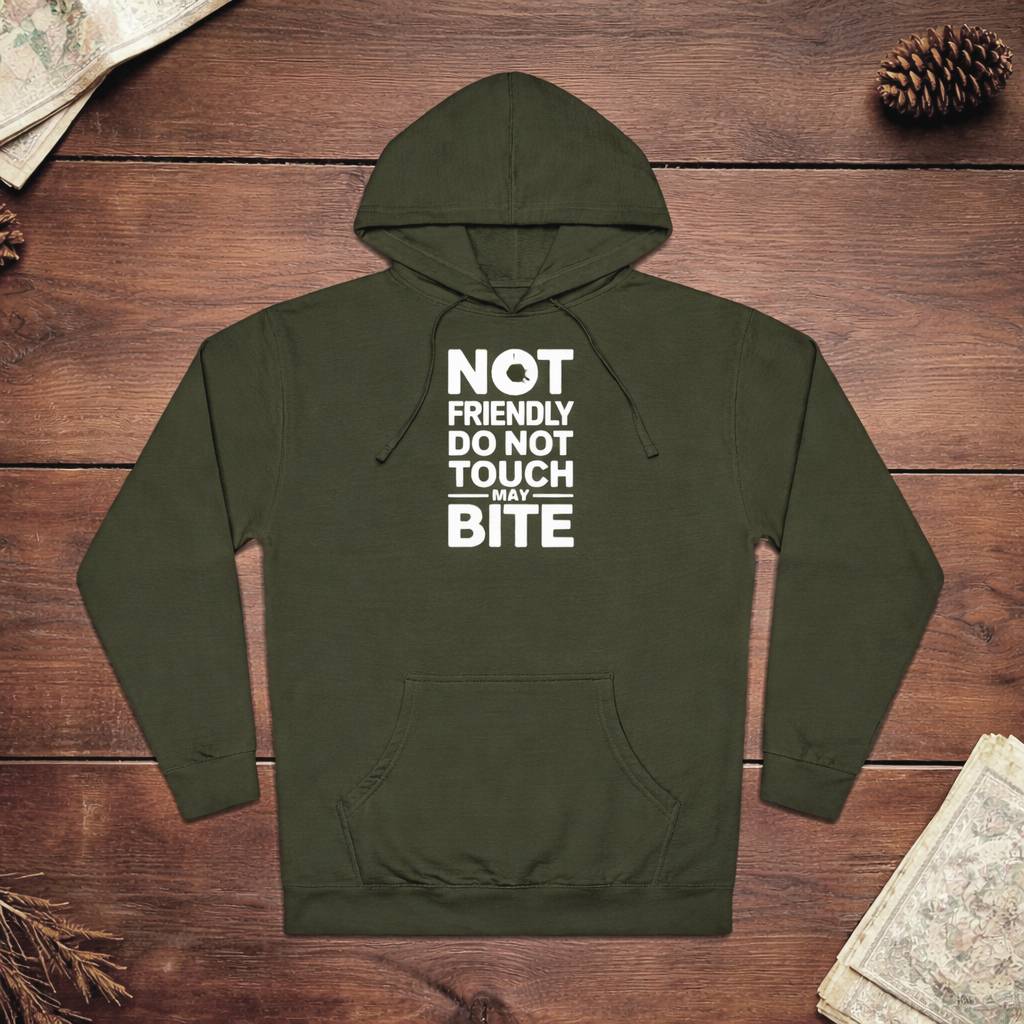 Green hoodie with text 'Not friendly do not touch may bite' on a wooden surface