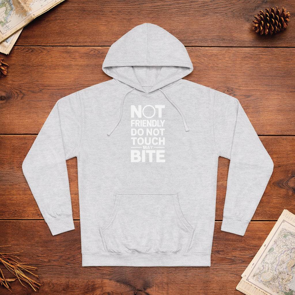 Gray hoodie with text on a wooden surface