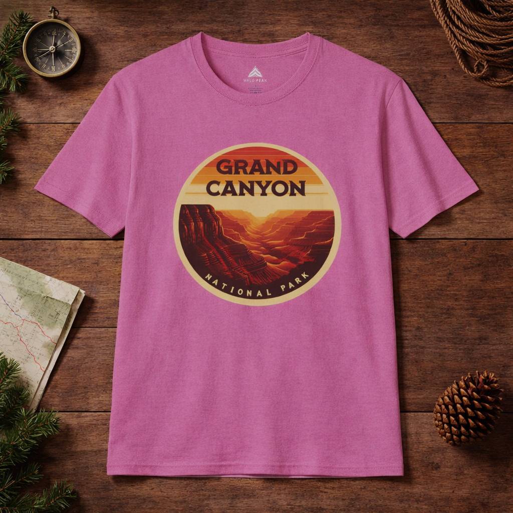 Pink t-shirt with Grand Canyon National Park graphic on a wooden surface