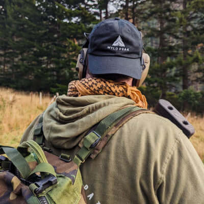 Hayden from Wyld Peak wearing a classic cap and hoodie.