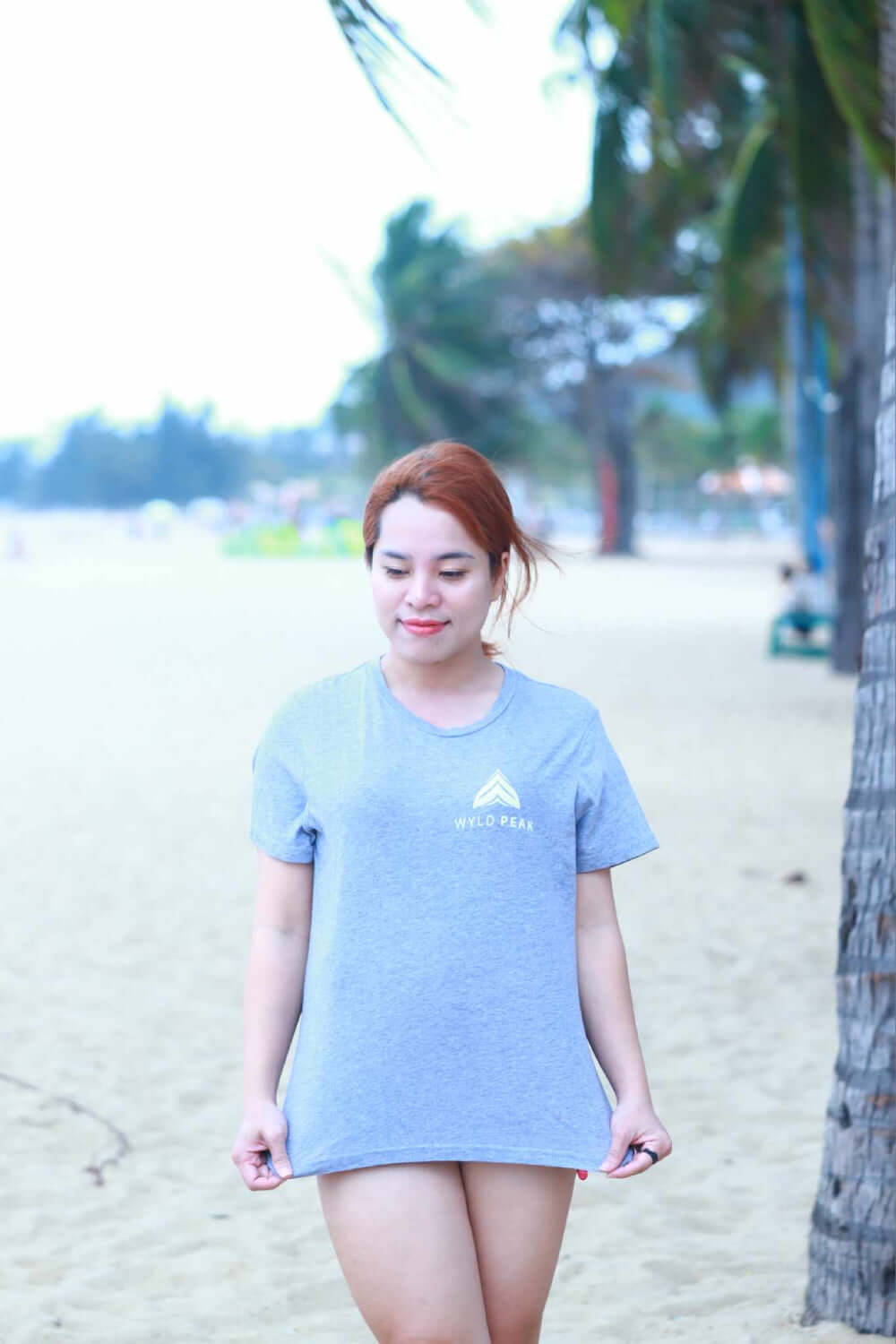 MissHolidaySaigon wearing a Wyld Peak organic tee in Nha Trang, Vietnam