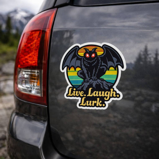 Car sticker with a mothman design and 'Live. Laugh. Lurk.' text on a vehicle.