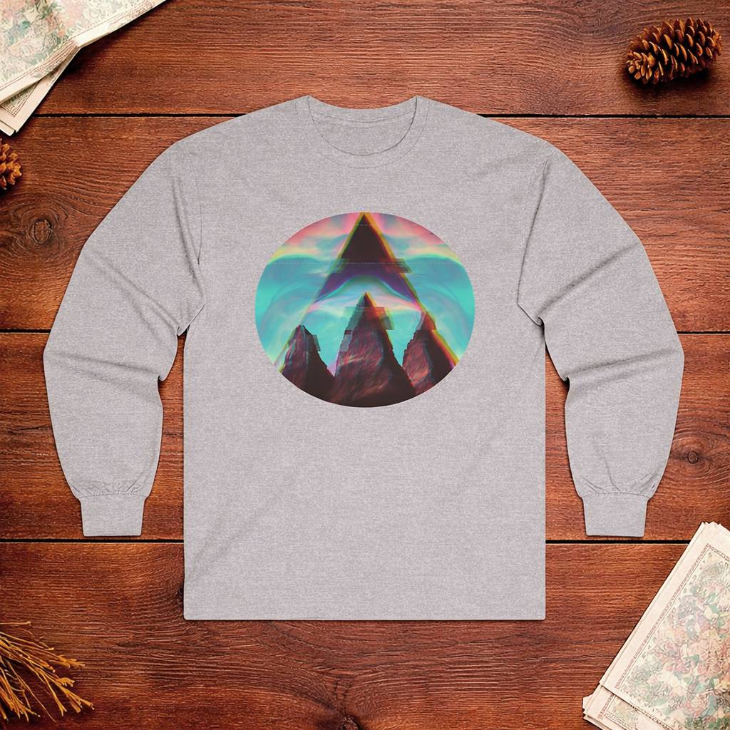 Gray long-sleeve shirt with a colorful mountain graphic on a wooden surface