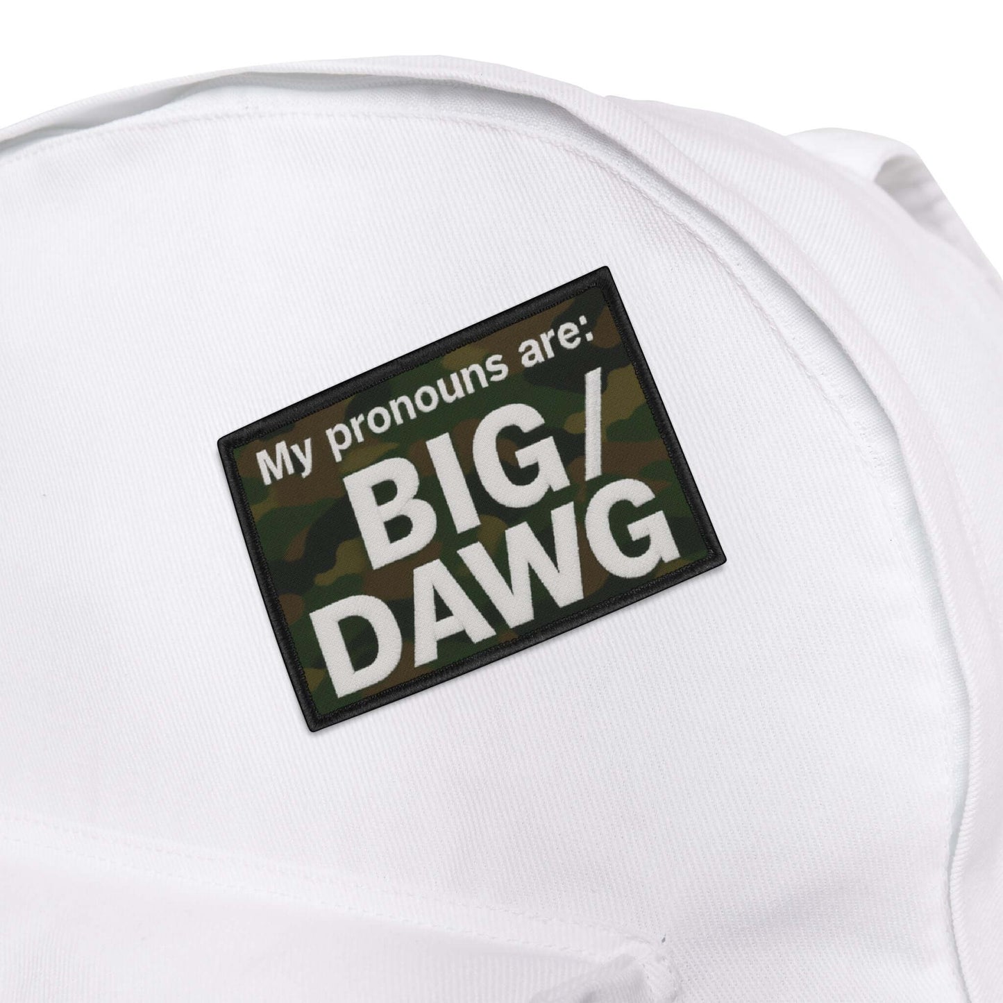 Camouflage patch with 'My pronouns are: BIG/DAWG' text on a white background