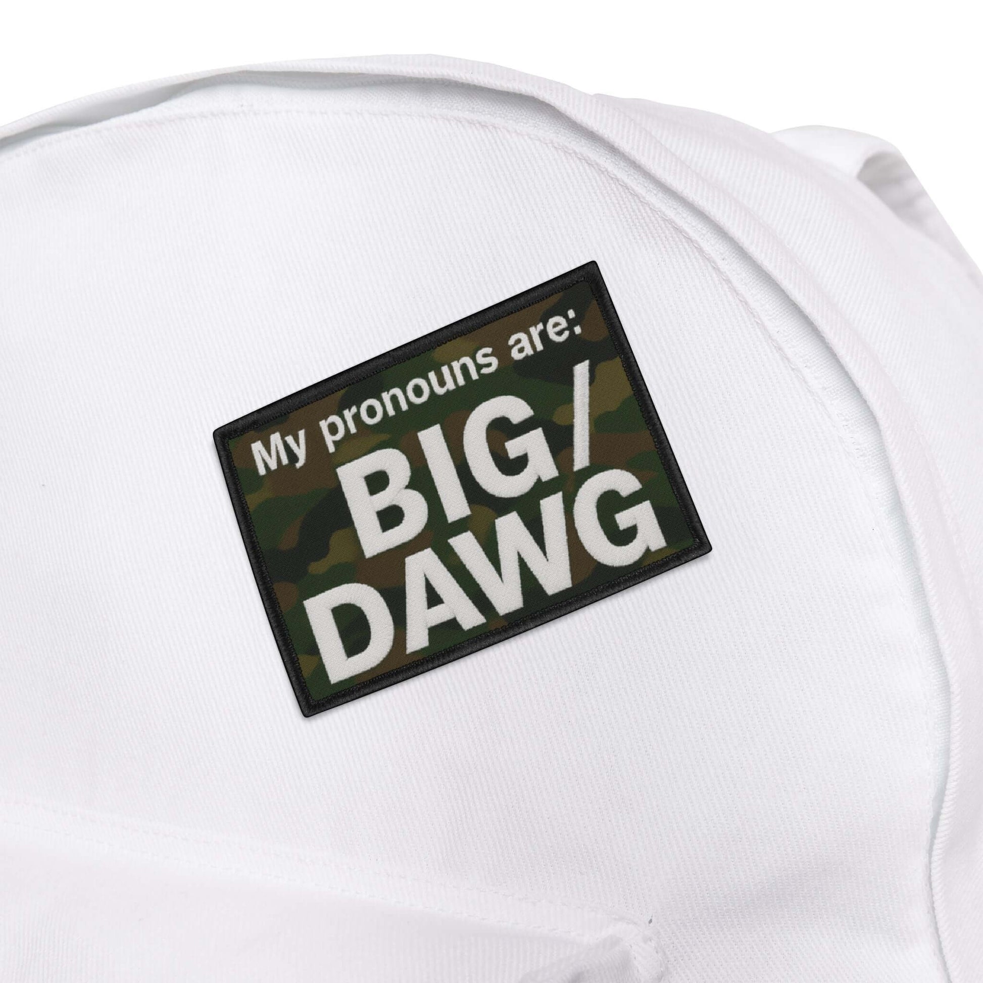 Camouflage patch with 'My pronouns are: BIG/DAWG' text on a white background