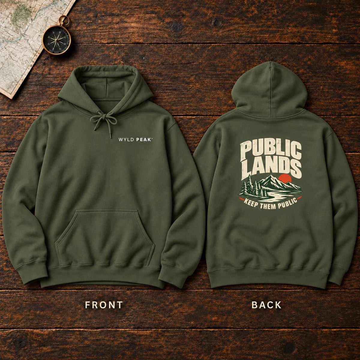 An olive green pullover hoodie shown from both front and back on a dark wood background. The front has a small white 'WYLD PEAK' logo on the left chest, and the back has a large cream and green graphic reading 'PUBLIC LANDS' with a mountain illustration and 'KEEP THEM PUBLIC' below.