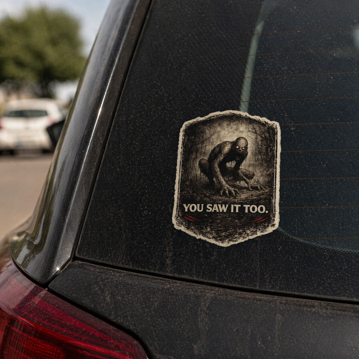 Rake creepypasta sticker on car bumper, horror creature vinyl decal with eerie design, bold and unsettling automotive sticker