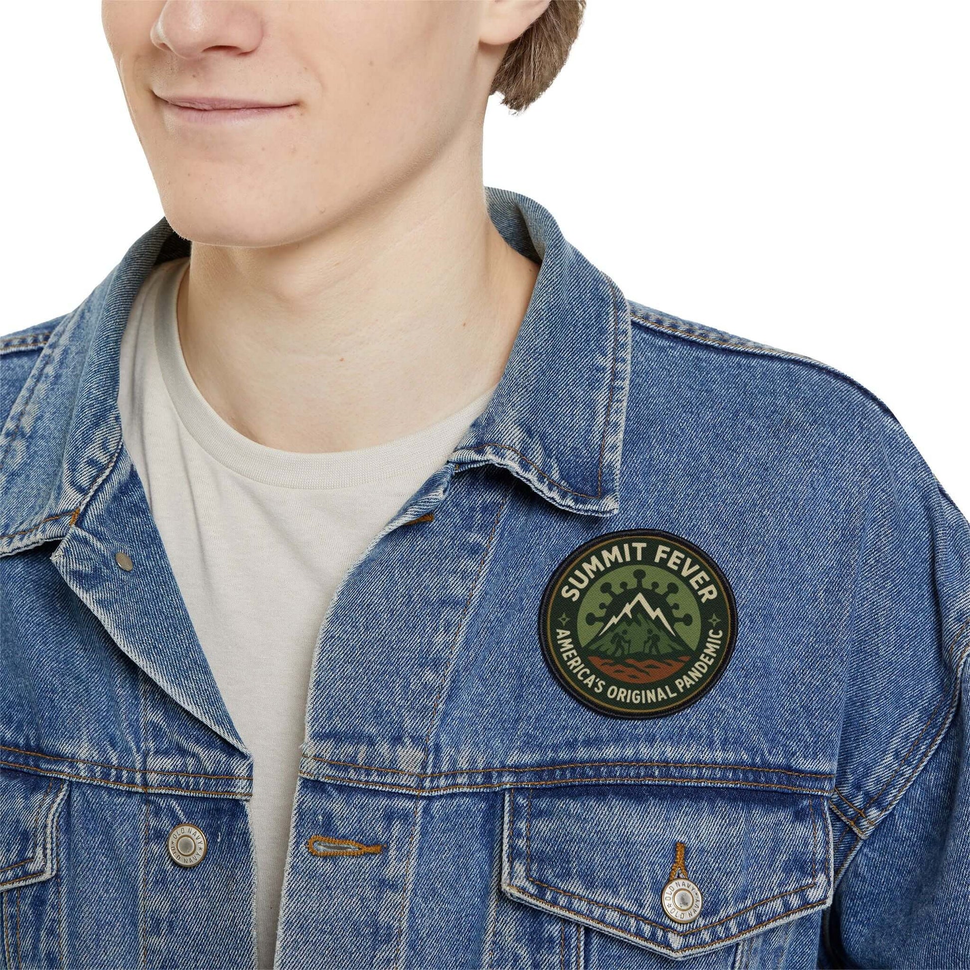 Summit Fever patch attached to man’s jacket - outdoor humor badge for hikers