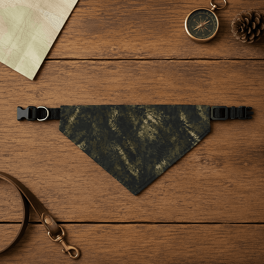 Camouflage bandana on a wooden surface with accessories.