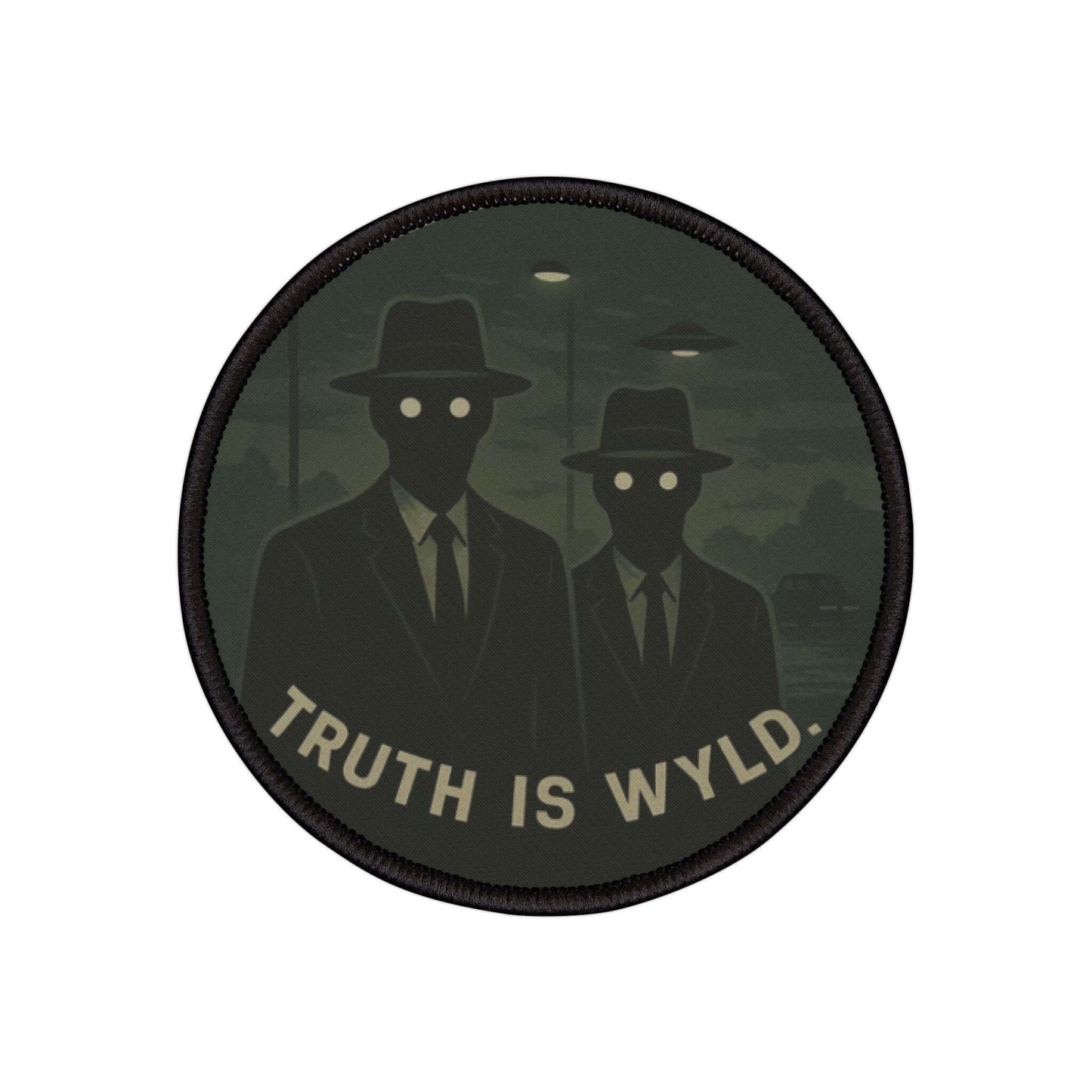Wyld Peak Men in Black patch with a white background