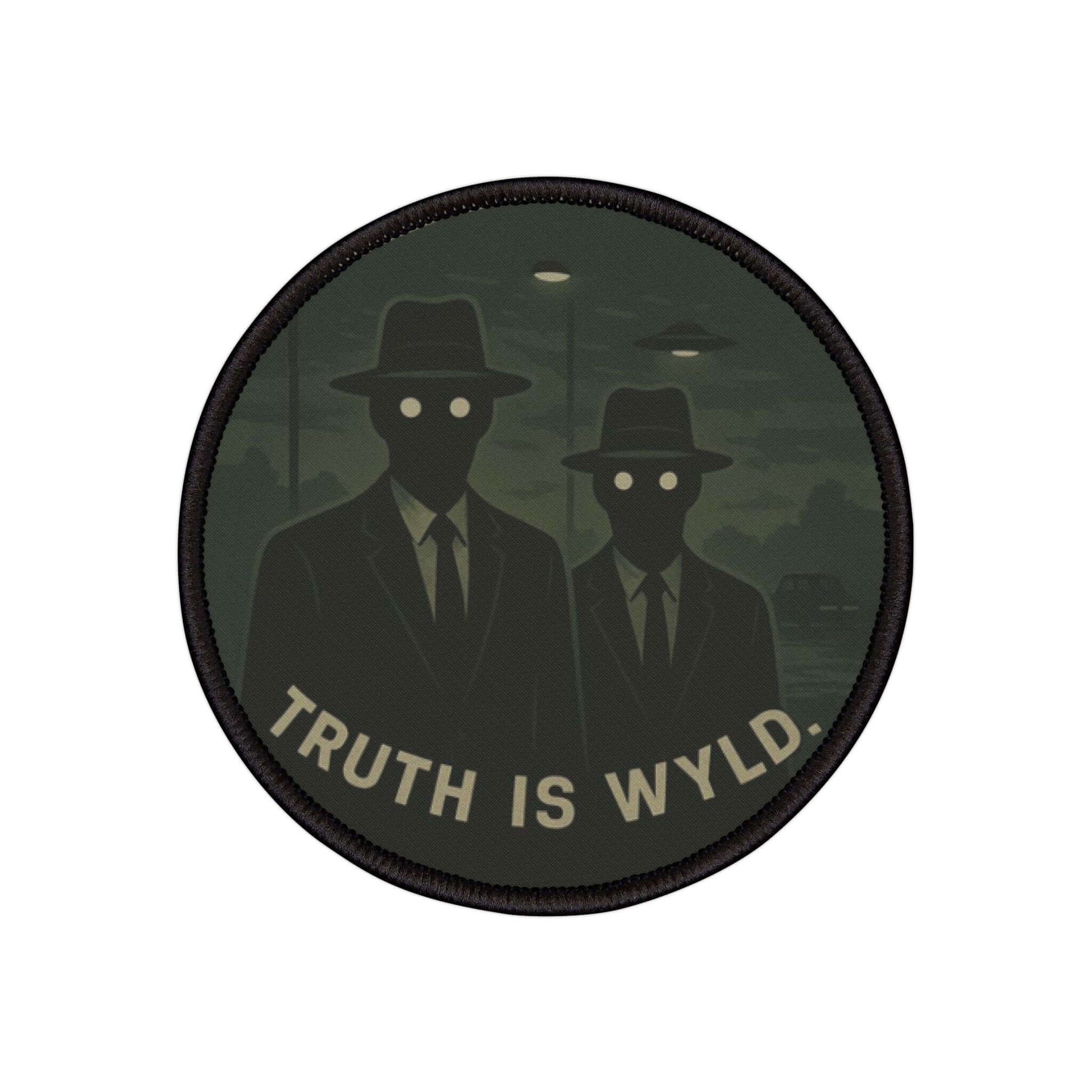 Wyld Peak Men in Black patch with a white background