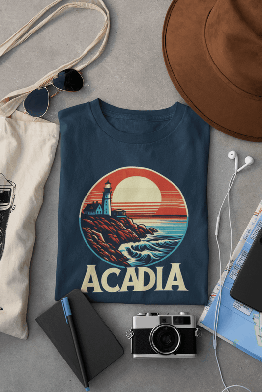 Wyld Peak Acadia National Park organic cotton tee in navy laid flat on desk.