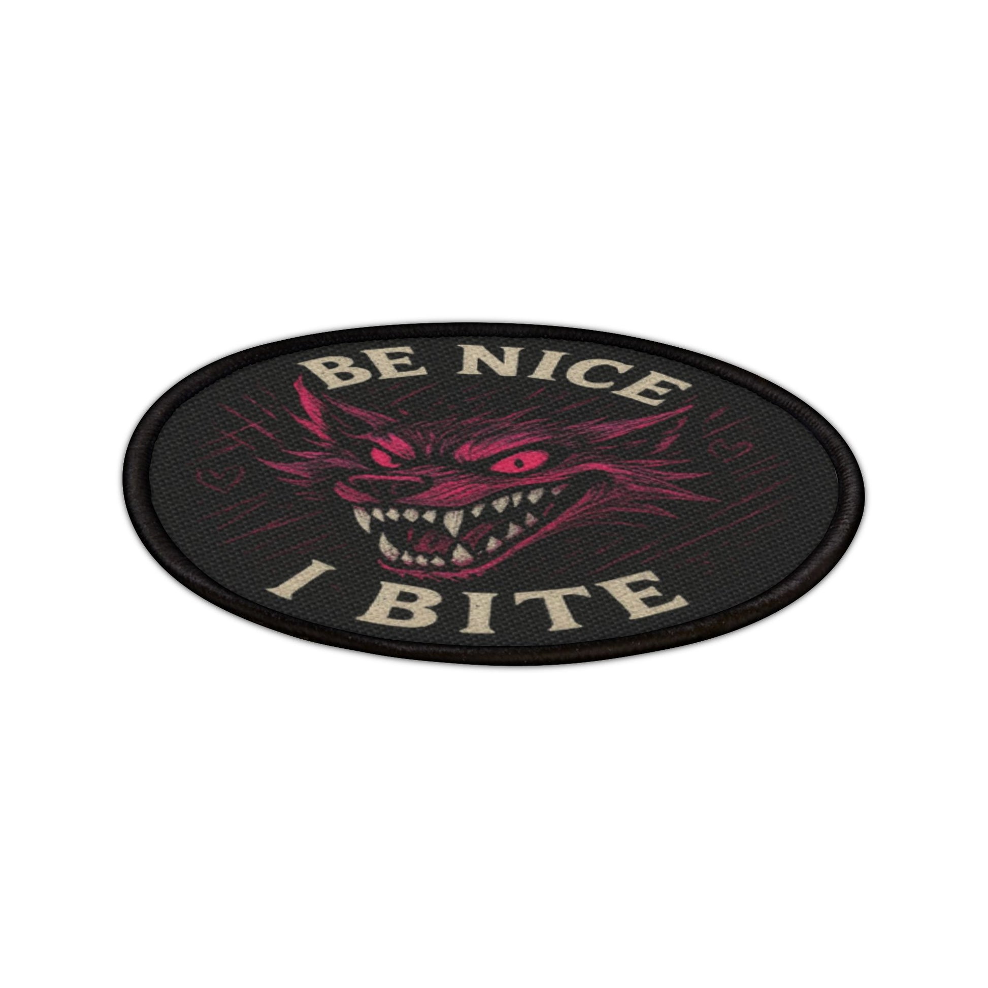 Close up angled view of the Be Nice I Bite wolf patch showing detailed stitching and texture