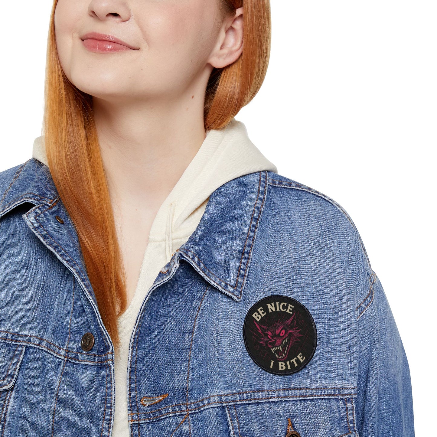 Be Nice I Bite wolf patch worn on a woman’s denim jacket, bold patch with personality