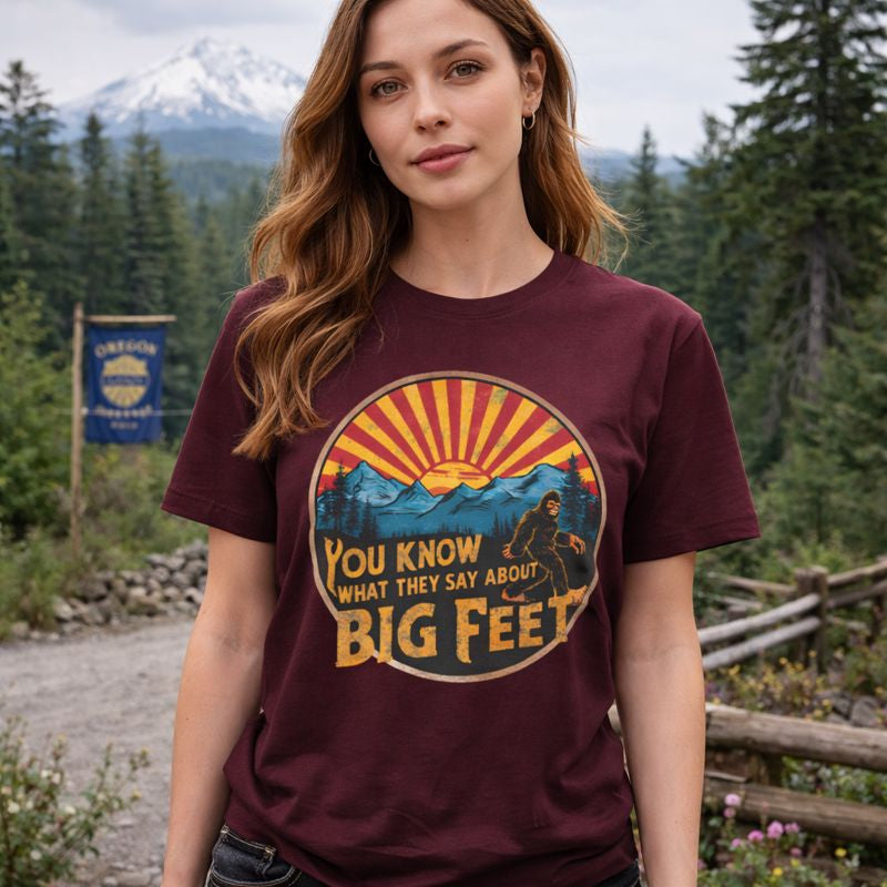 Woman wearing a t-shirt with a graphic design in a forest setting