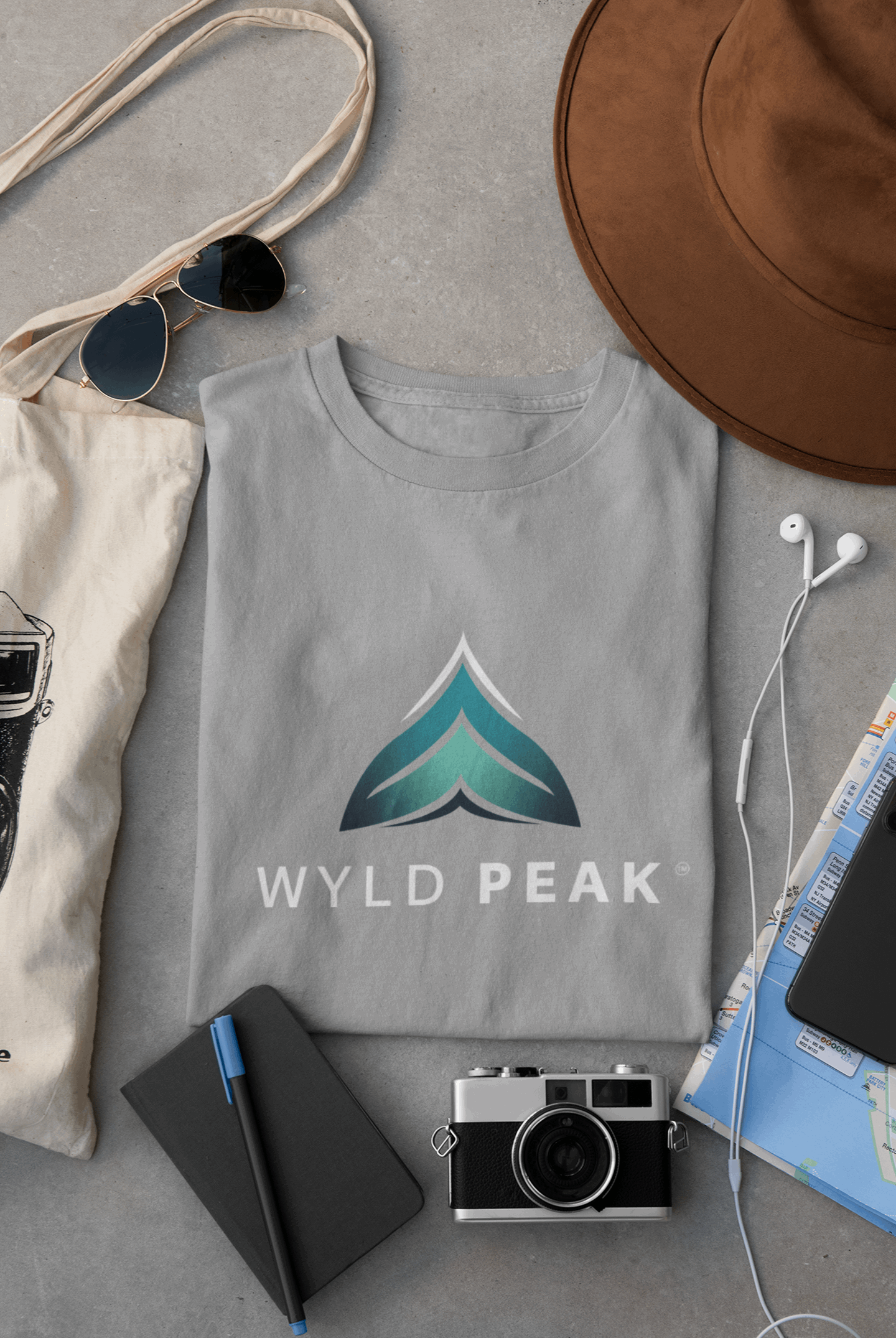 Grey Wyld Peak branded men's organic cotton t-shirt flat lay photo