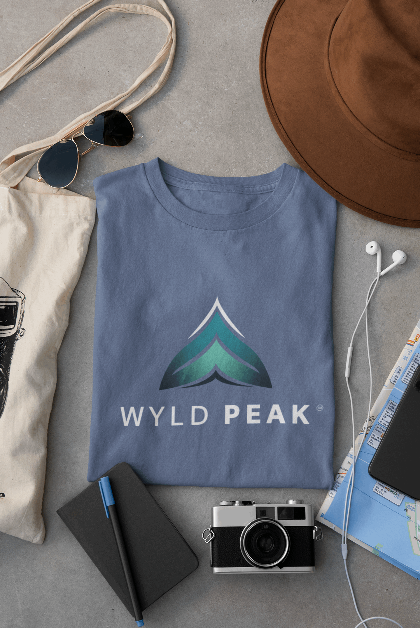 Indigo blue Wyld Peak branded men's organic cotton t-shirt flat lay
