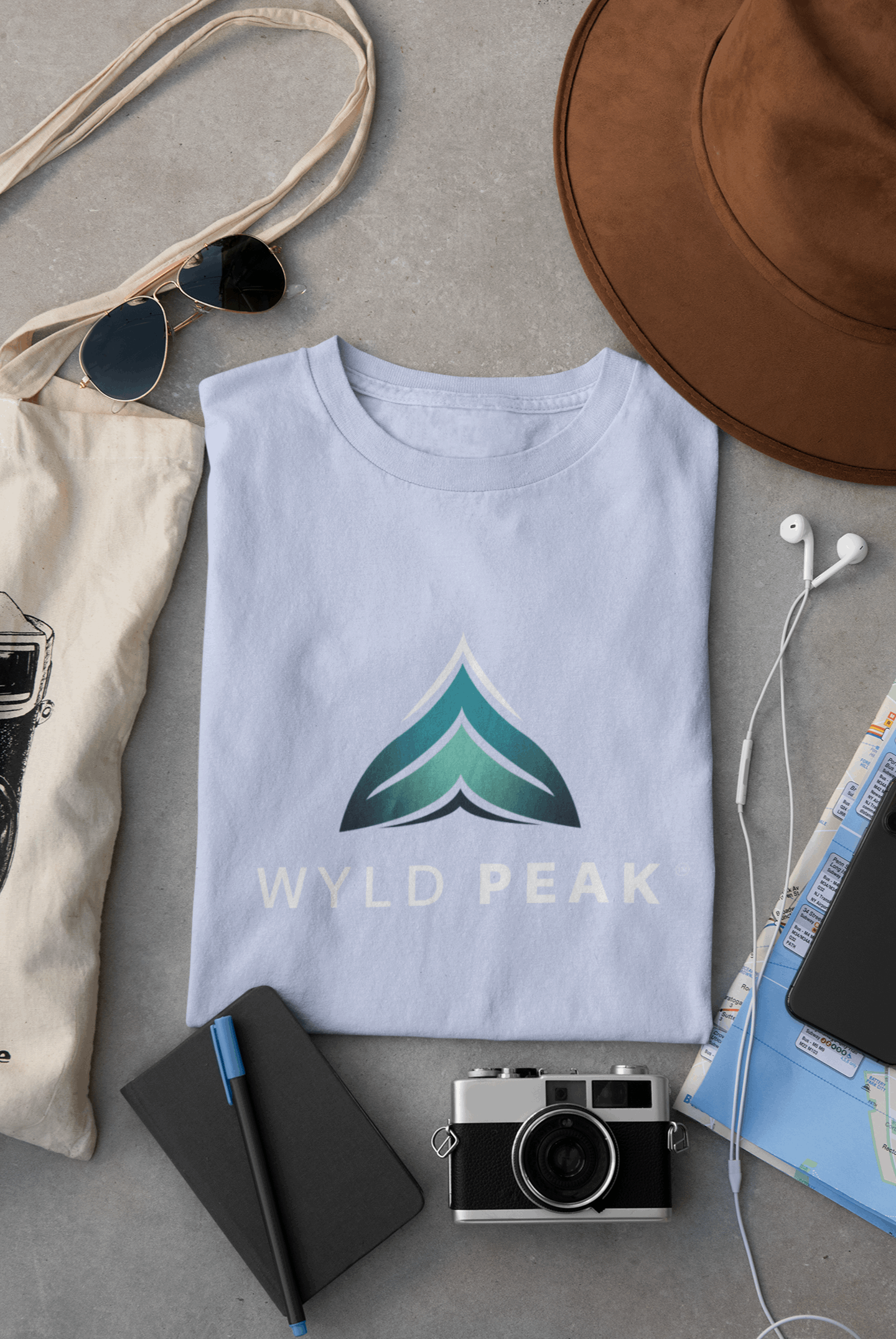 Light blue Wyld Peak branded men's organic cotton t-shirt flat lay product image