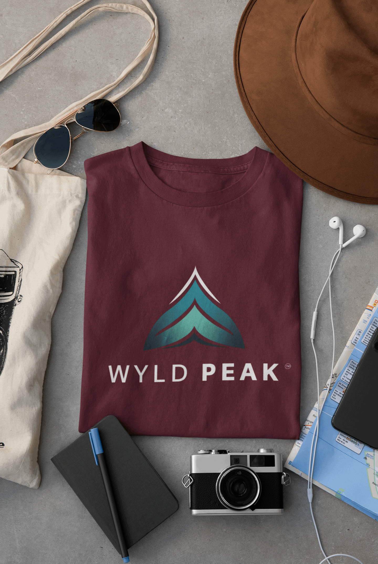 Maroon Wyld Peak branded men's organic cotton t-shirt flat lay photo