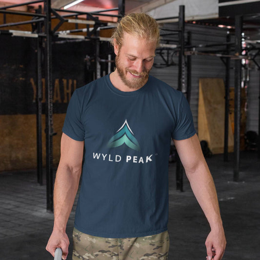 Man wearing Wyld Peak classic tee at gym workout.