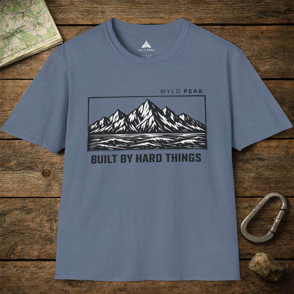 Do Hard Things organic adventure tee in heather indigo shown as a layflat, soft textured fabric with adventure focus