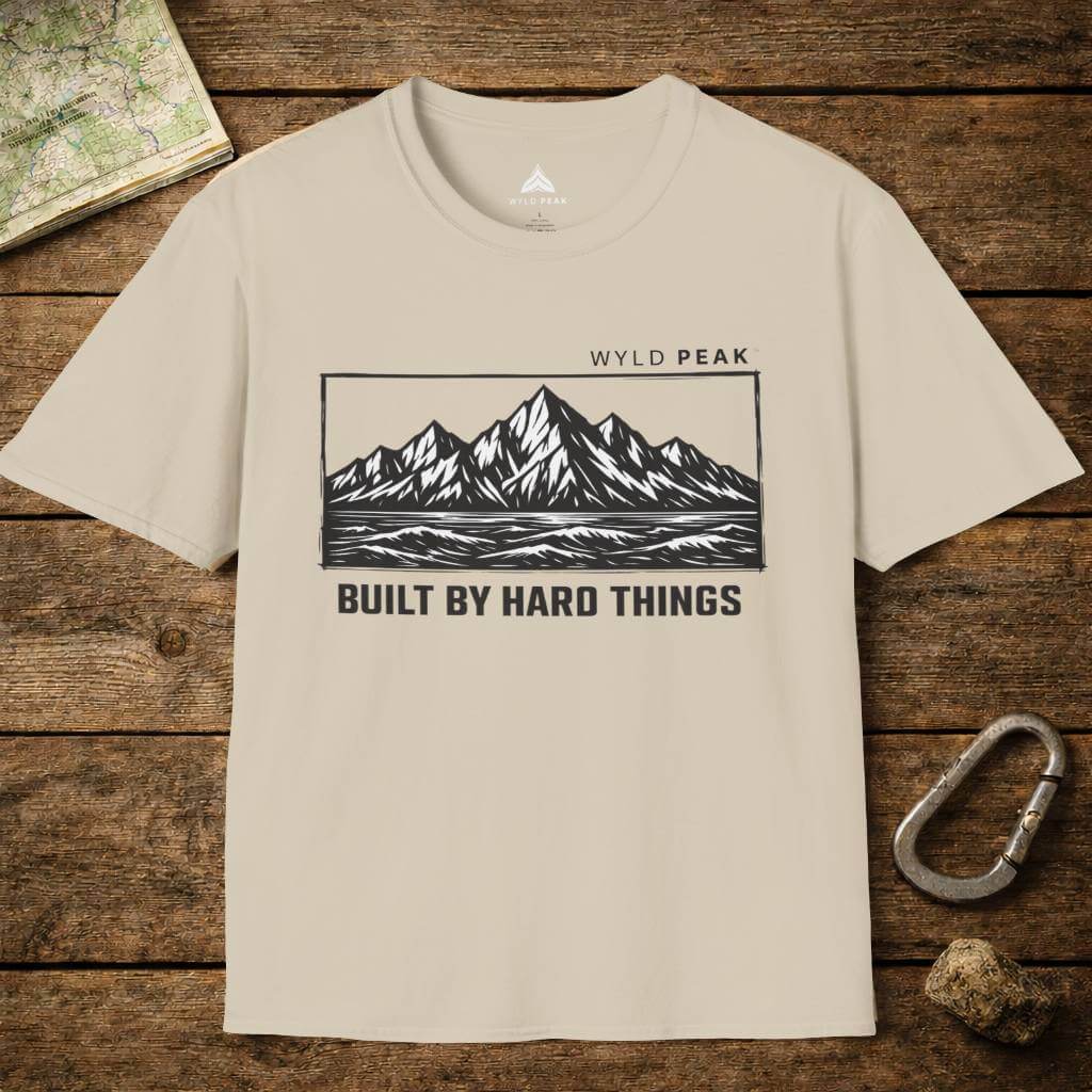 Do Hard Things organic adventure tee in sand color shown as a layflat, earthy tone designed for outdoor lifestyles