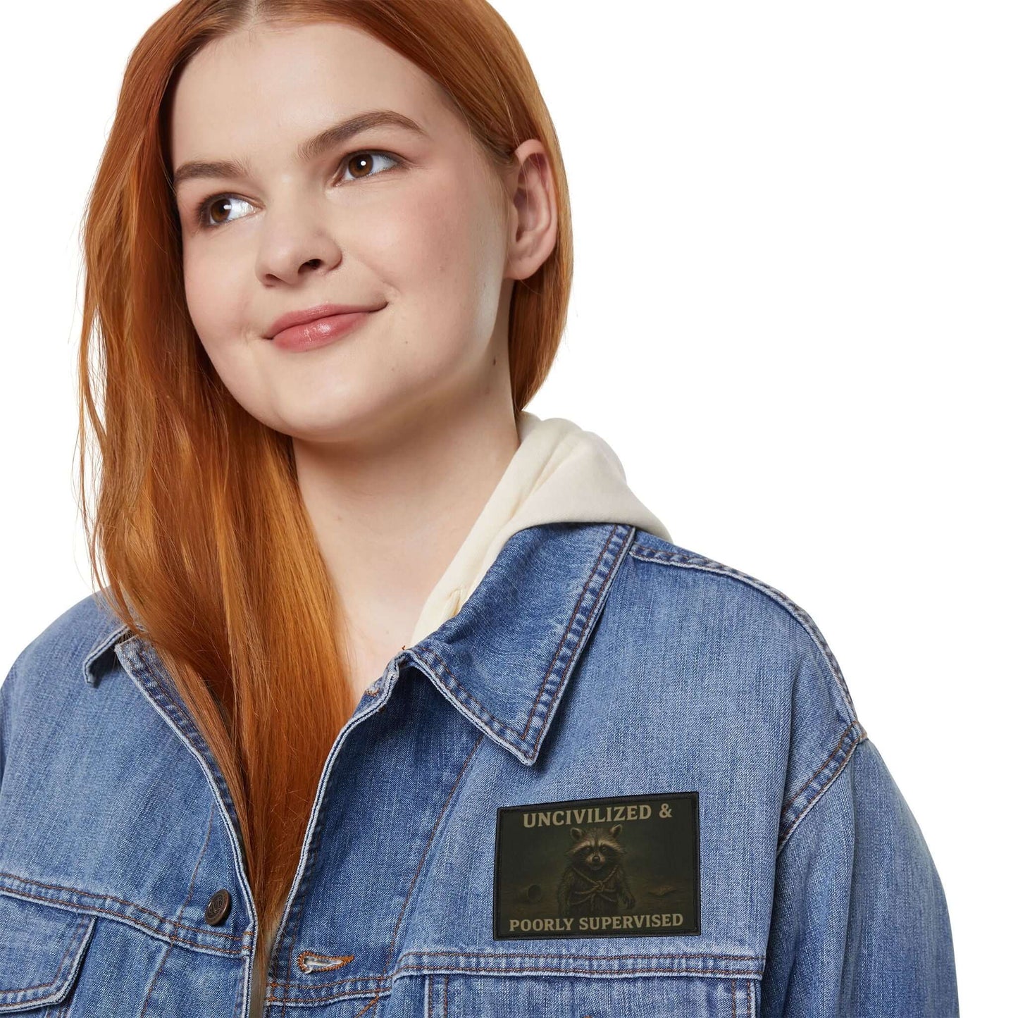 Feral Raccoon patch worn on a woman’s denim jacket, expressive patch with wild personality