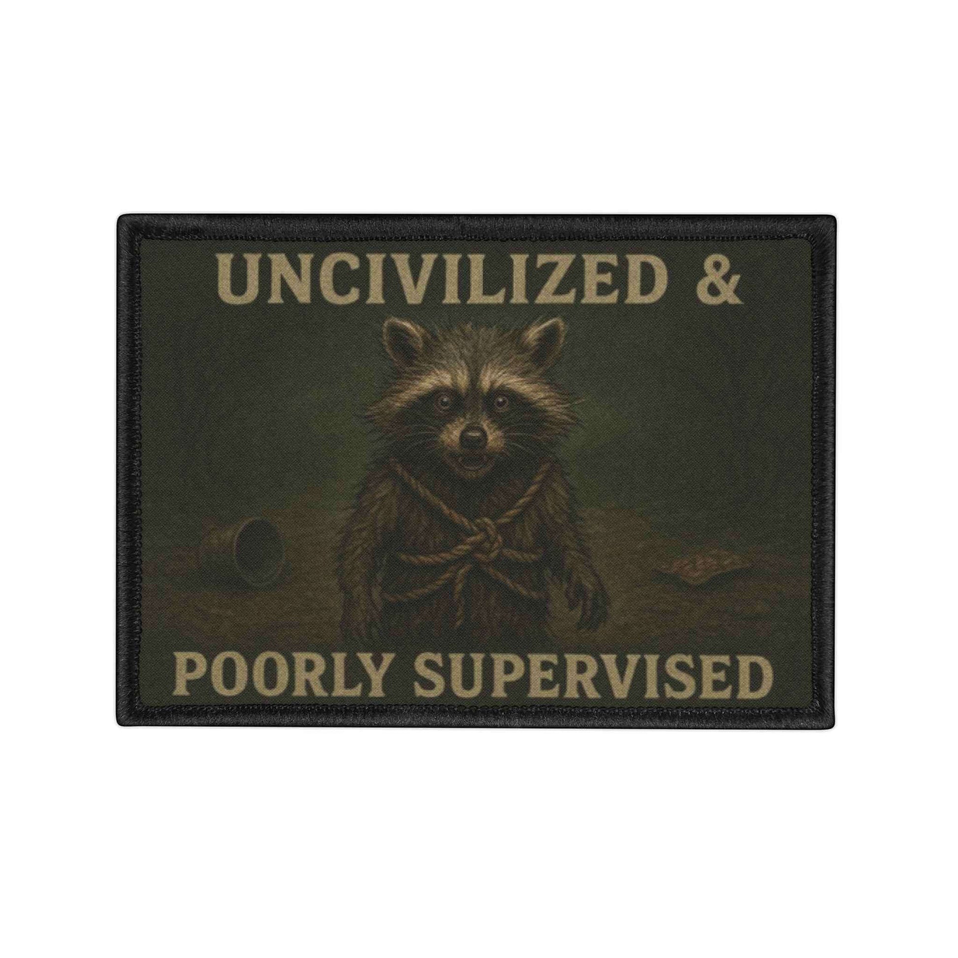 Feral Raccoon patch displayed on a white background, clean view of detail and stitching