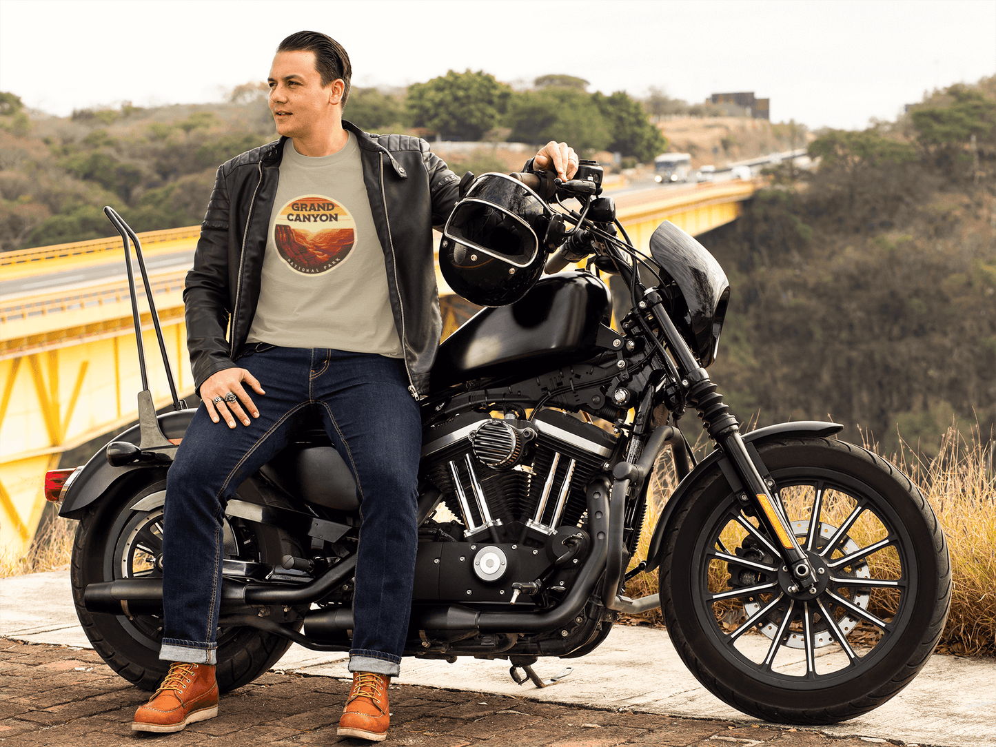 Grand Canyon South Rim tee in desert tan from Wyld Peak worn by man with motorbike in California.