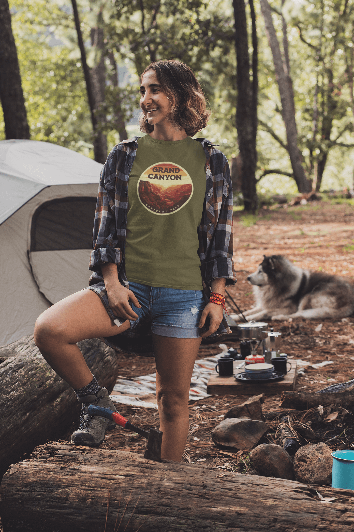 Grand Canyon South Rim tee in military green from Wyld Peak worn by woman at Yosemite campsite.