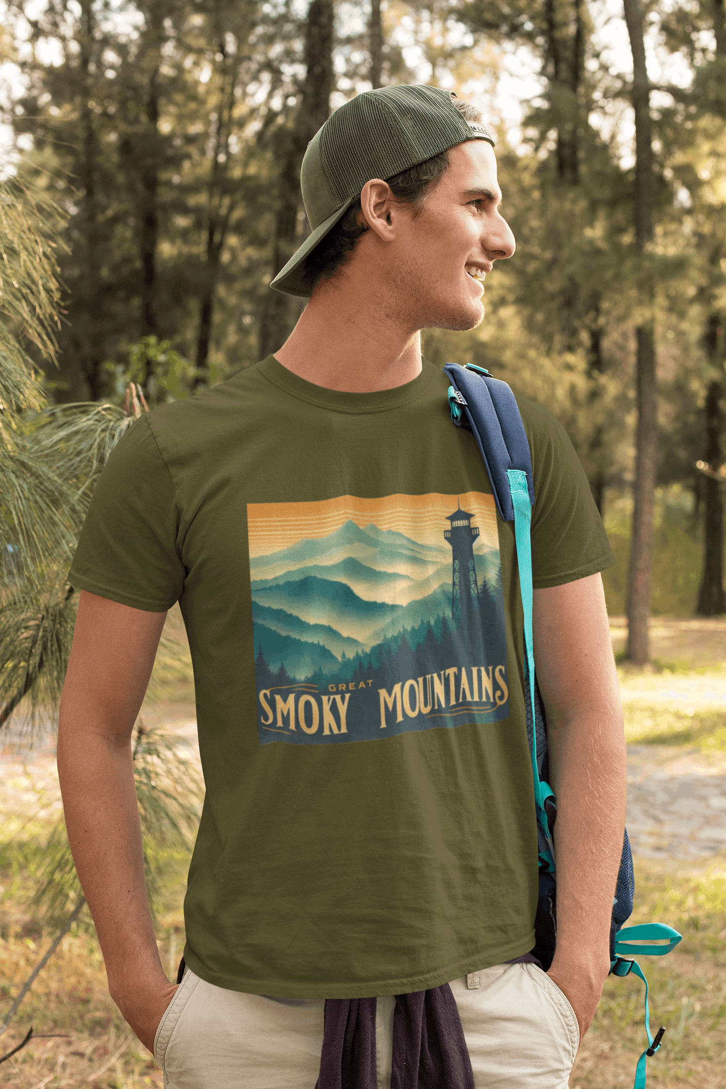 Man outdoors wearing Wyld Peak Great Smoky Mountains National Park organic tee in green.
