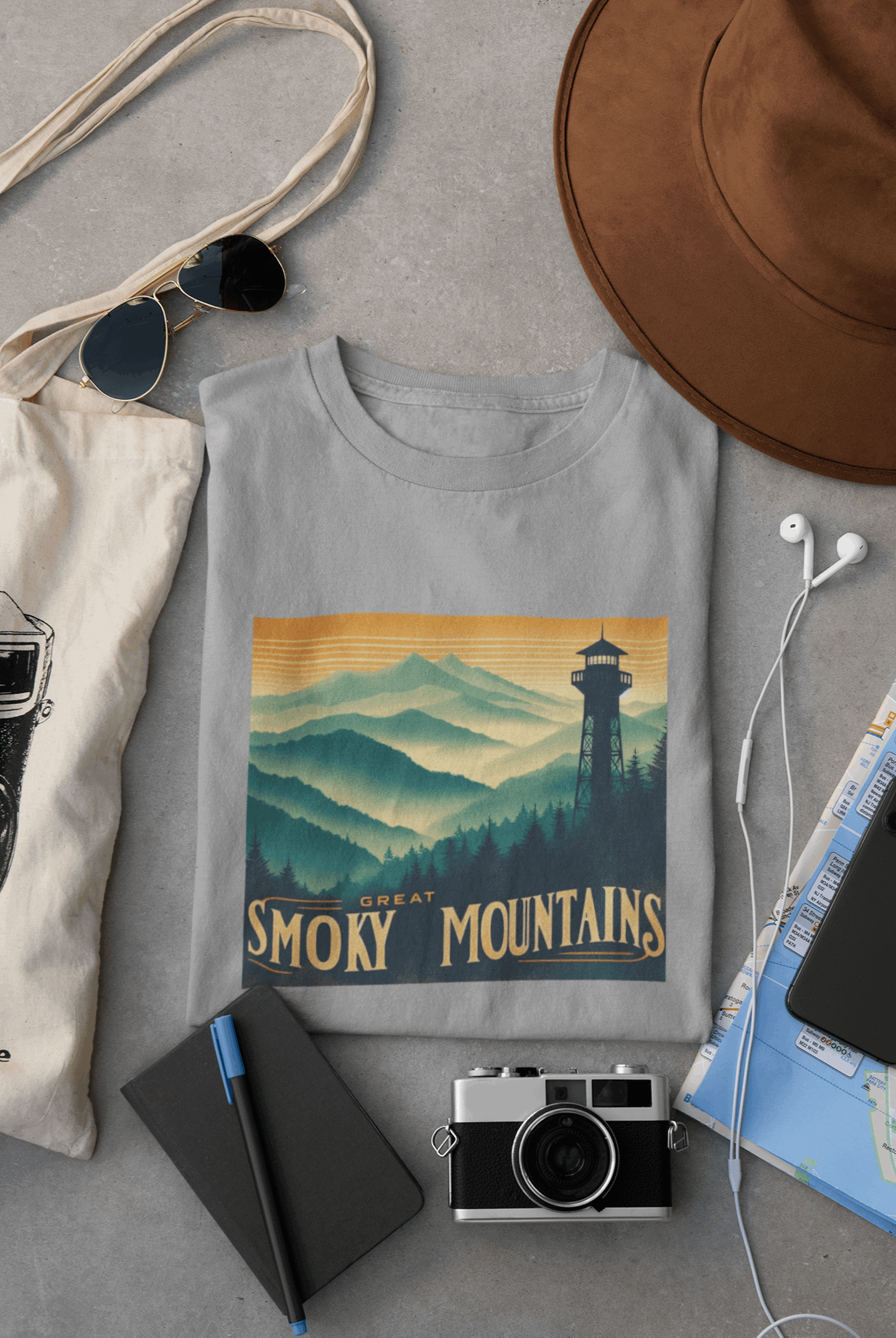 Wyld Peak Great Smoky Mountains National Park organic cotton tee in grey laid flat on desk.