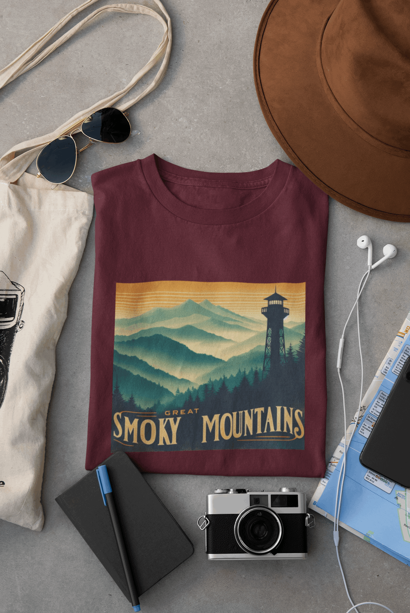 Wyld Peak Great Smoky Mountains National Park organic cotton tee in maroon laid flat on desk.