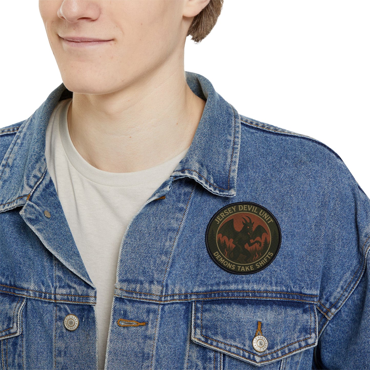 Jersey Devil embroidered patch worn on a man’s denim jacket, cryptid folklore patch with rugged street style