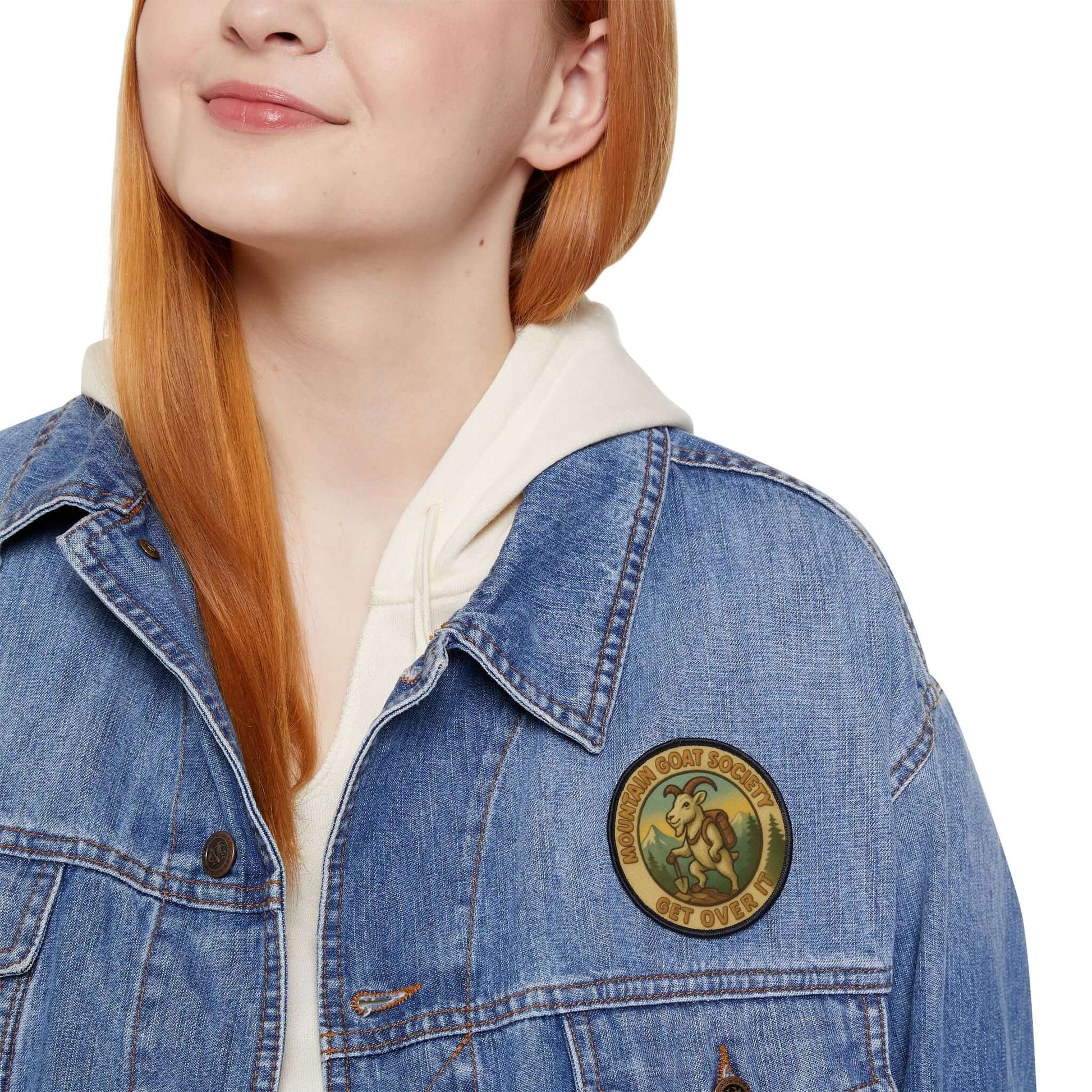 Mountain Goat Society patch worn on a woman’s denim jacket, adventure driven patch for everyday wear