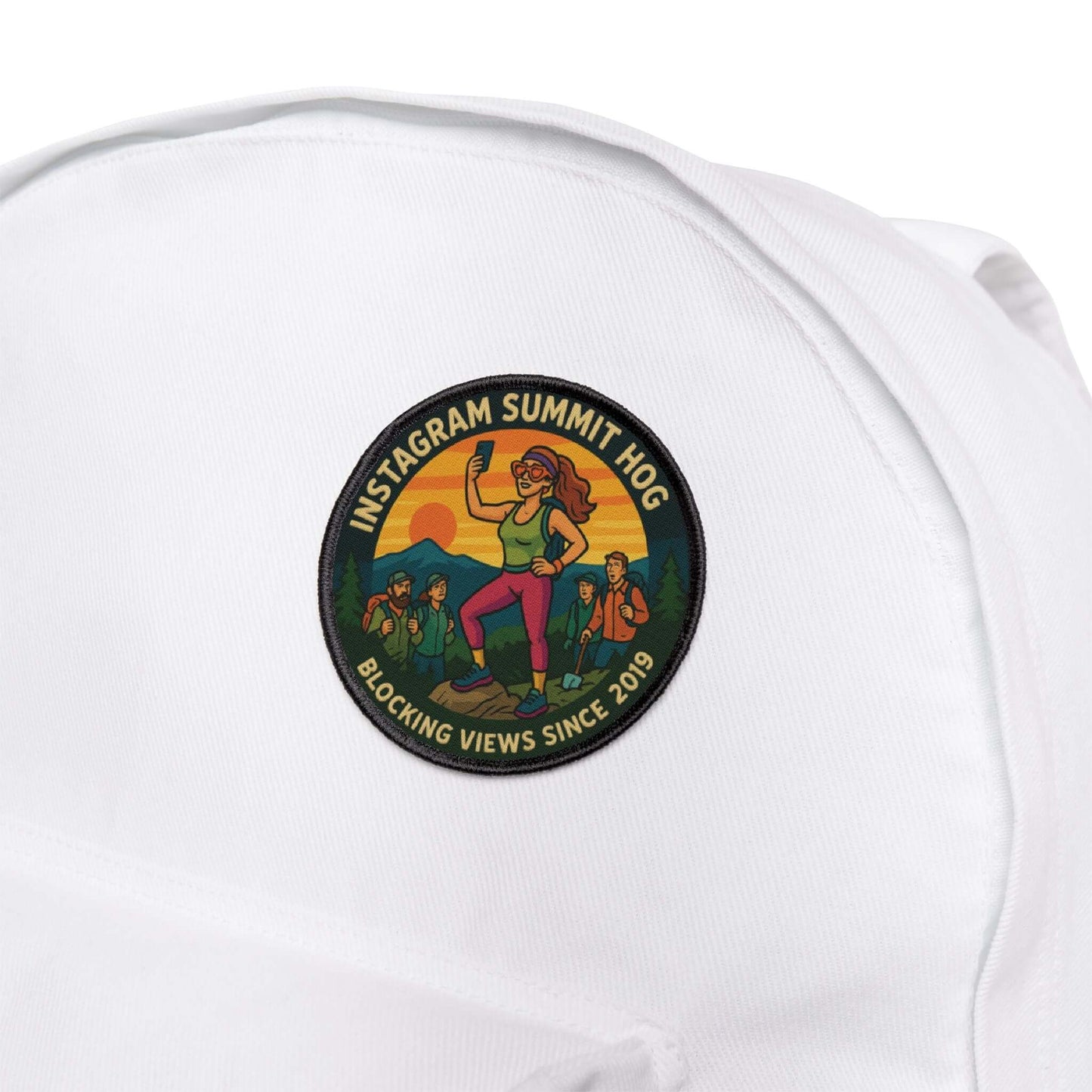 Wyld Peak Summit Hog patch on a white hiking backpack
