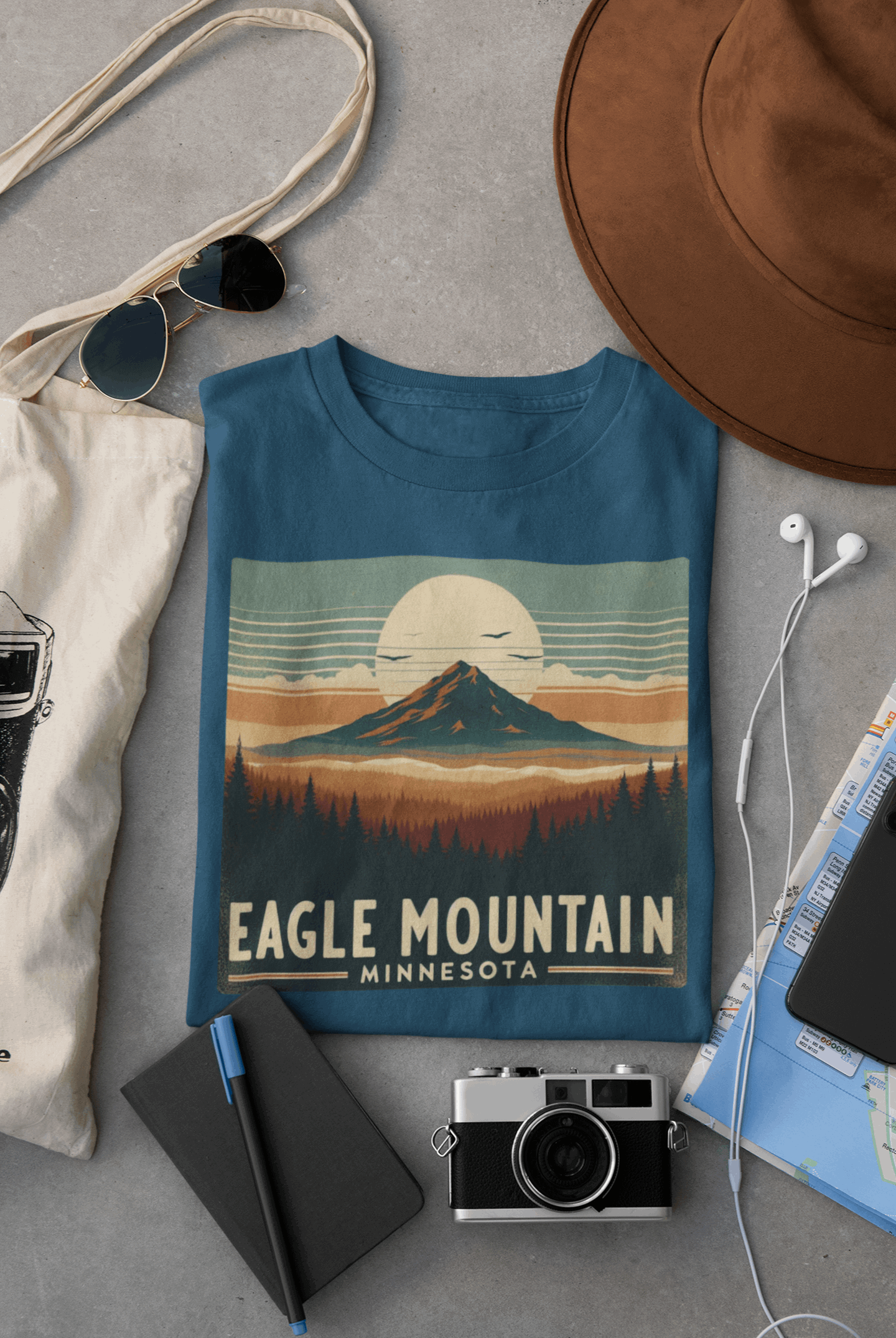 Eagle Mountain tee in blue laid flat by Wyld Peak