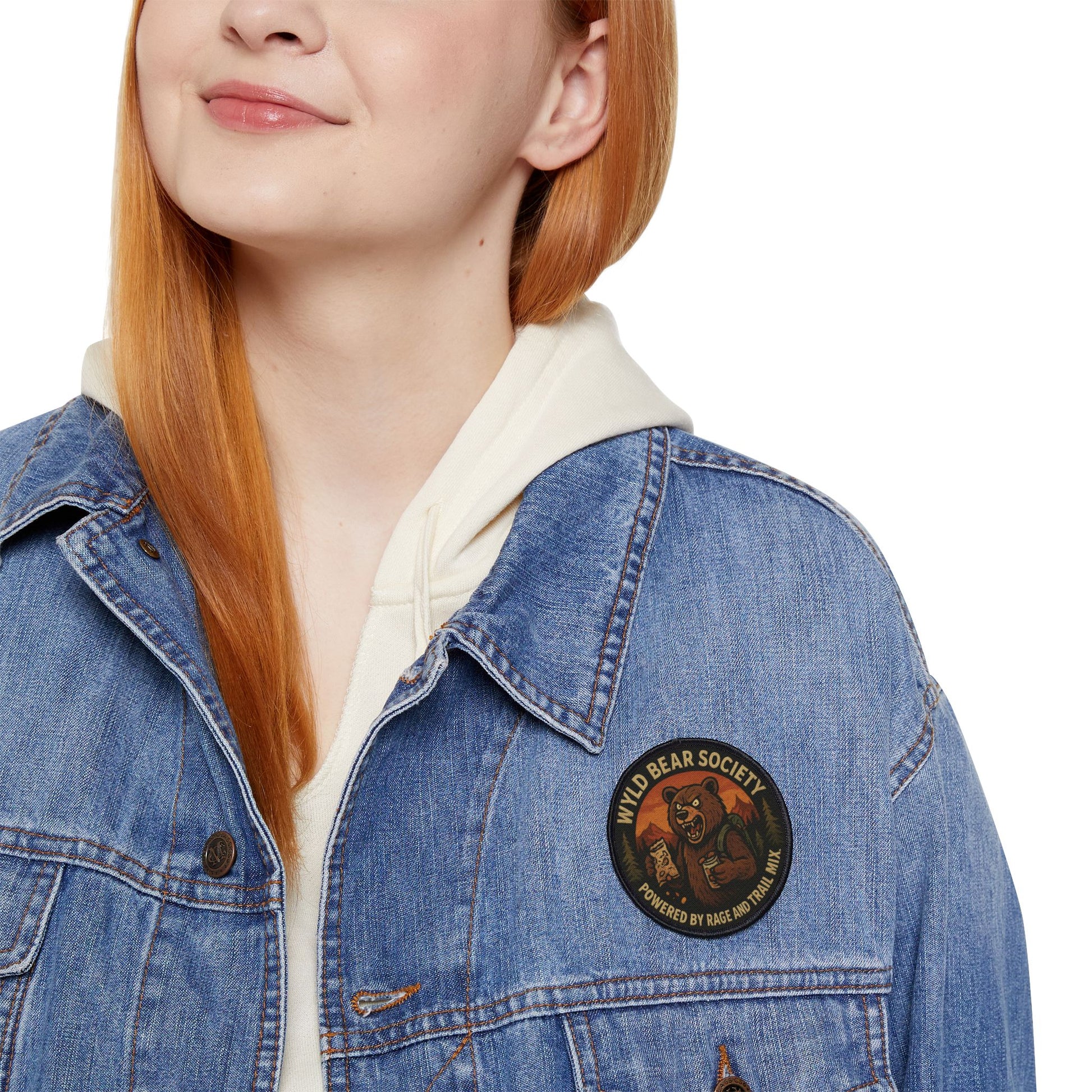 Wyld Bear Society patch worn on a woman’s denim jacket, nature inspired patch for everyday wear