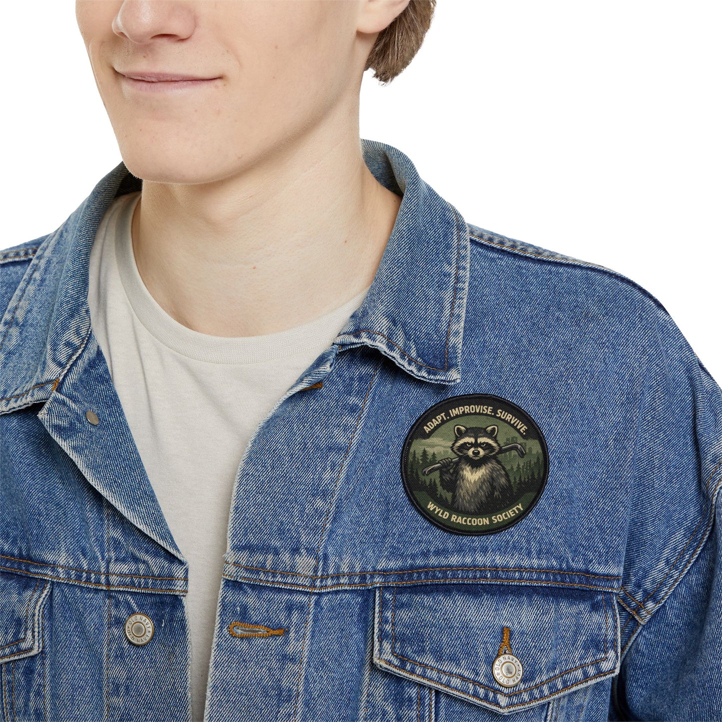 Wyld Raccoon Society patch worn on a man’s denim jacket, outdoor lifestyle patch with character