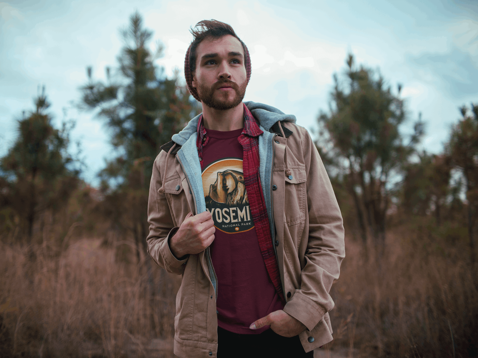 Man in California wearing Wyld Peak Yosemite Half Dome organic cotton tee in maroon.