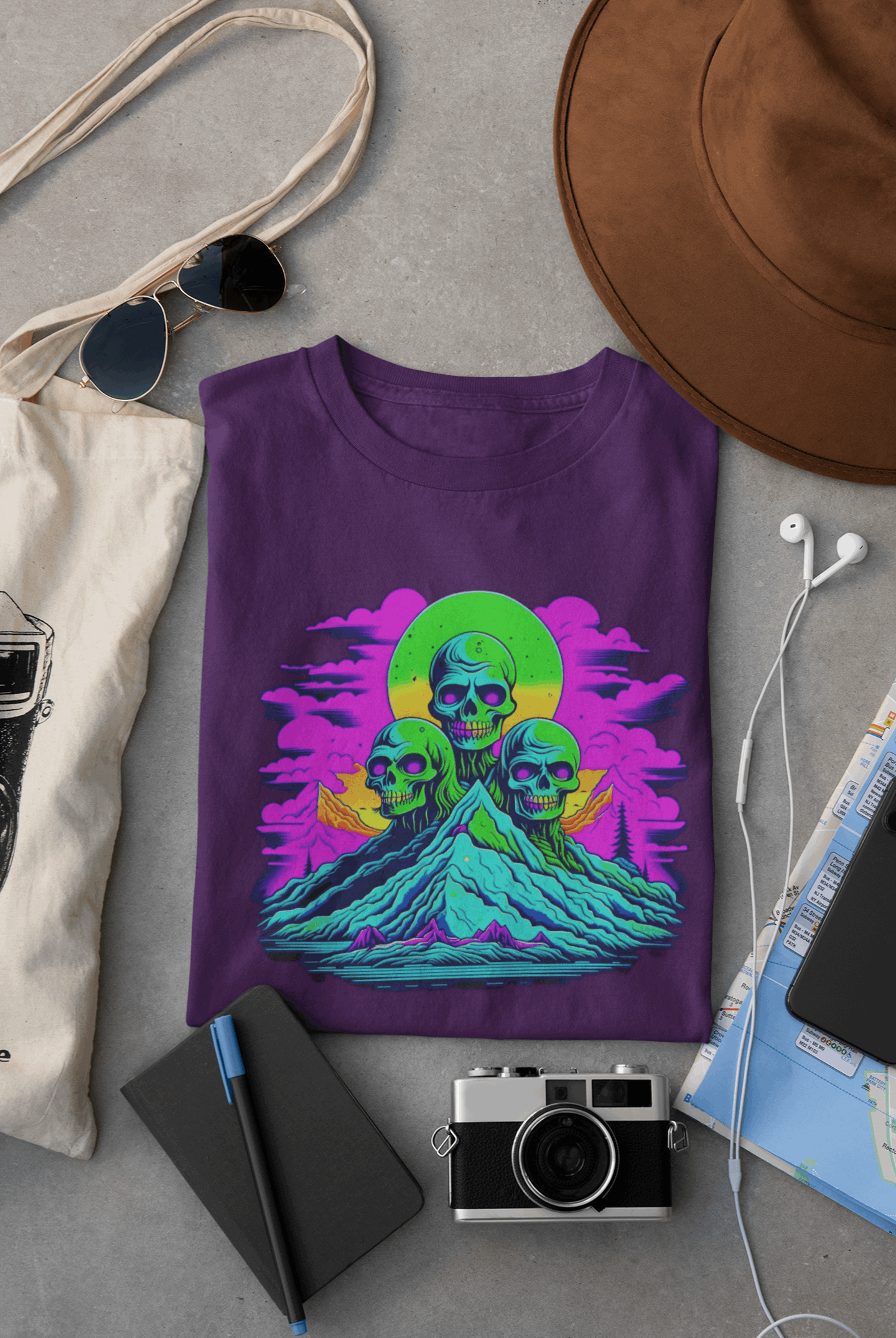 Wyld Peak Zombie Skull organic cotton skater women's T-shirt in purple lay flat on desk.