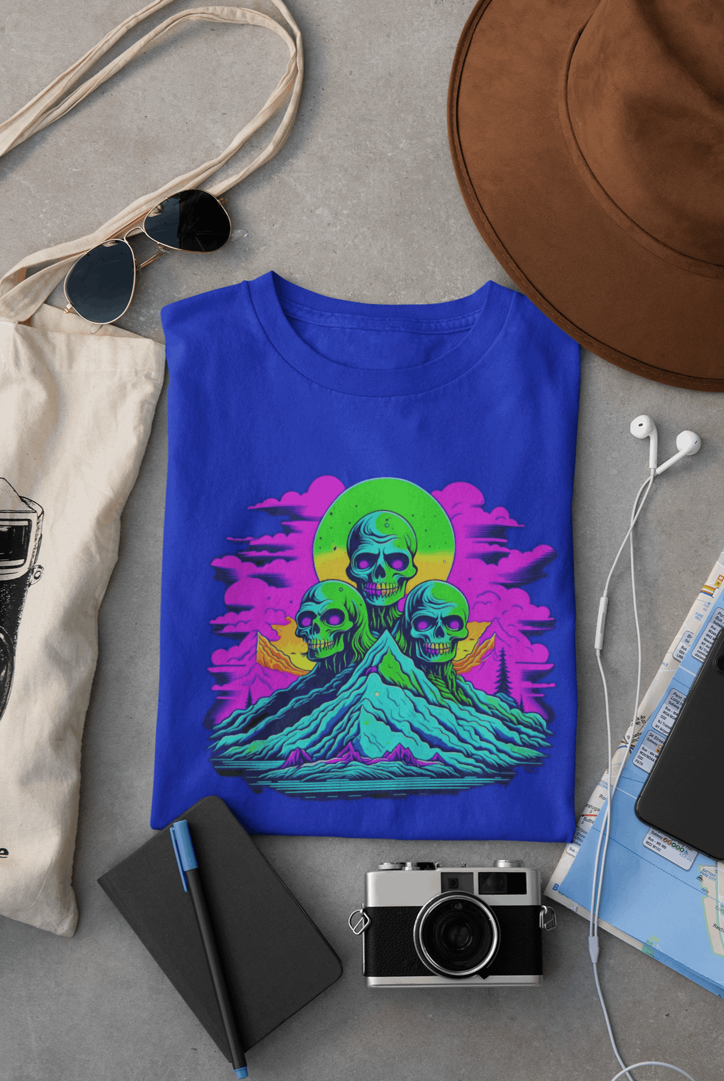 Wyld Peak Zombie Skull organic cotton skater women's T-shirt in royal blue lay flat on desk.